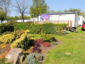 Bungalow de 2 chambres avec piscine partagee et jardin amenage a Litteau